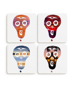 Set of four coasters, each showcasing a distinct skull design, perfect for adding a touch of edgy charm to your décor.